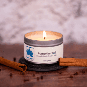 Pumpkin chai scented soy wax candle for fall in an 8oz travel tin.